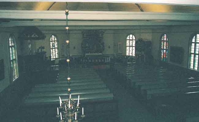 kyrkorummet från läktaren mot koret.