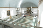 Utblick över kyrkorummet mot koret, från orgelläktaren i väster.