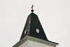 Små målade urtavlor på Murum kyrkas torntak, vilka alla visa olika tid. Neg.nr. B963_005:24. JPG. 