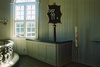 Korbänk och psalmnummertavla i korets södra del i Ölsremma kyrka, från NV.