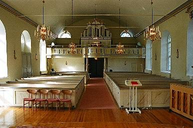 Kyrkorummet i Holsljunga kyrka sett från koret mot orgelläktaren i väster, från Ö.