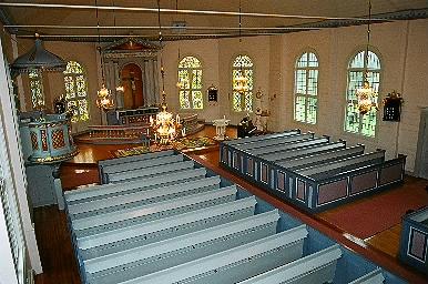 Långhuset i Mjöbäcks kyrka sett från orgelläktaren i väster, från NV.