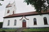 Kyrkans sydfasad med trappgavelstornet i väster, från S.
