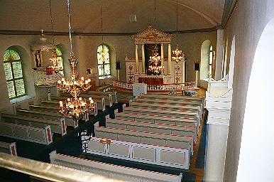 Kyrkorummet i Fritsla kyrka sett från läktaren, från SV.