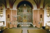 Gustav Adolfs kyrka sedd mot koret från läktaren. Kormålningen är från 1950-talet då hela kyrkan renoverades.