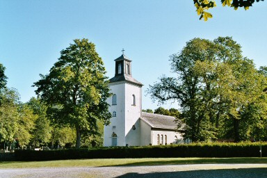 Sparlösa kyrka och kyrkogård från sydväst. Neg.nr. 04/143:01. JPG.