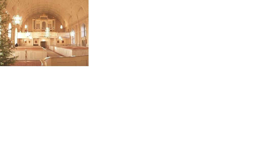 By kyrka, interiör bild av kyrkorummet sett mot orgelläktaren och vapenhuset i väster. 
