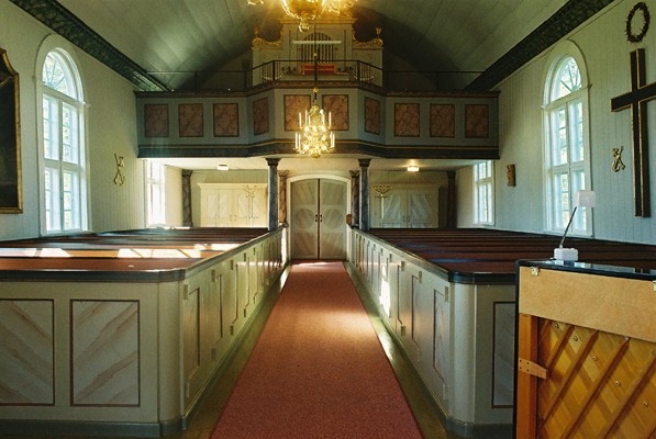 Långhuset i Ölsremma kyrka sett från koret mot läktaren, från Ö.