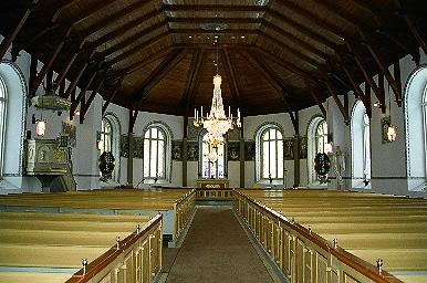 Kyrkorummet i Fotskäls kyrka sett mot koret i öster, från V.